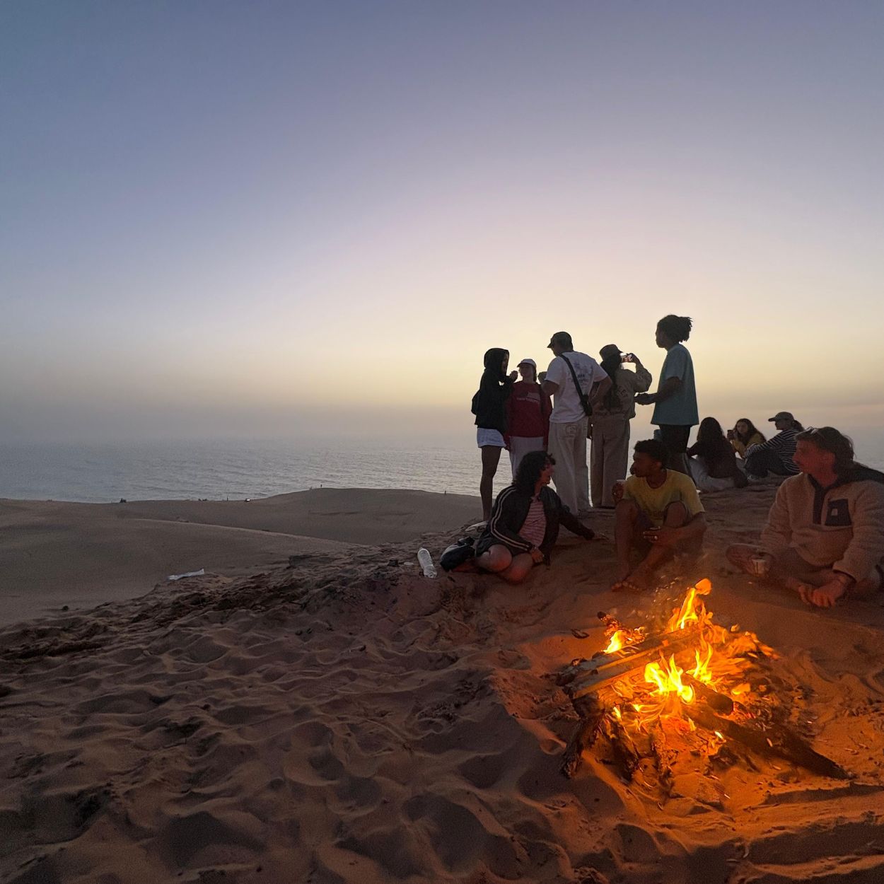 Sunset sandboarding near Taghazout as an alternative to surfing