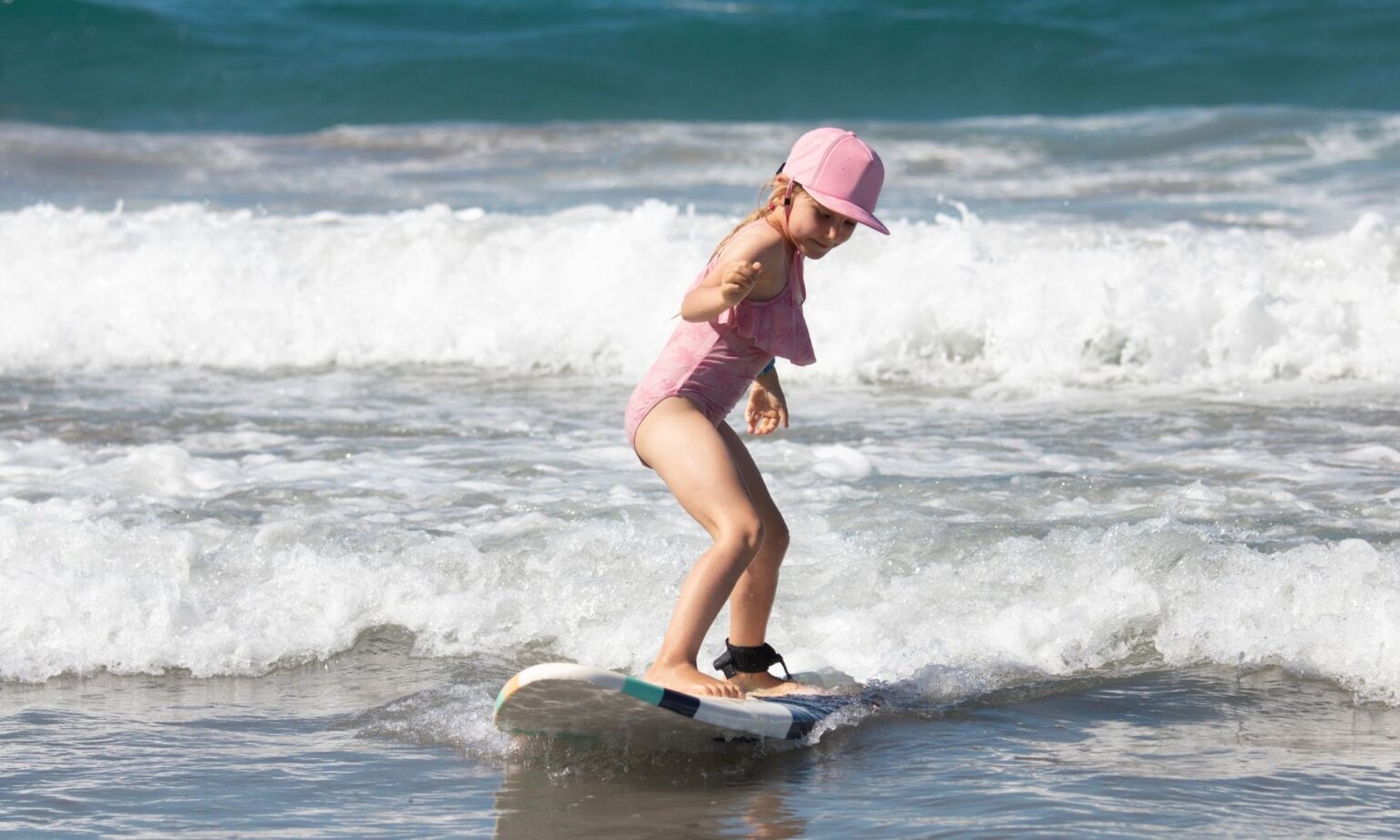 Family surf lesson Taghazout summer, kids enjoying the waves